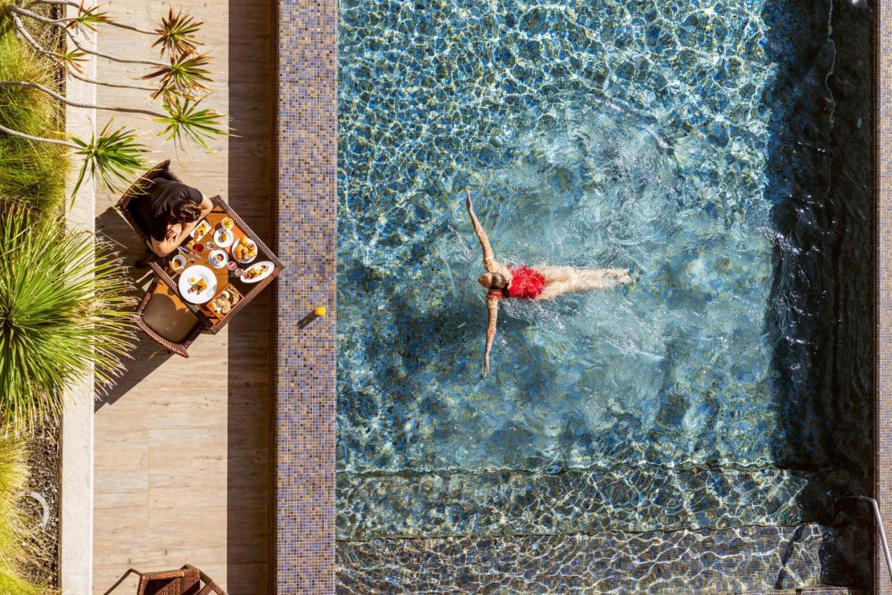 Saccharum - Resort And Spa - Savoy Signature Calheta  Εξωτερικό φωτογραφία The pool at the hotel